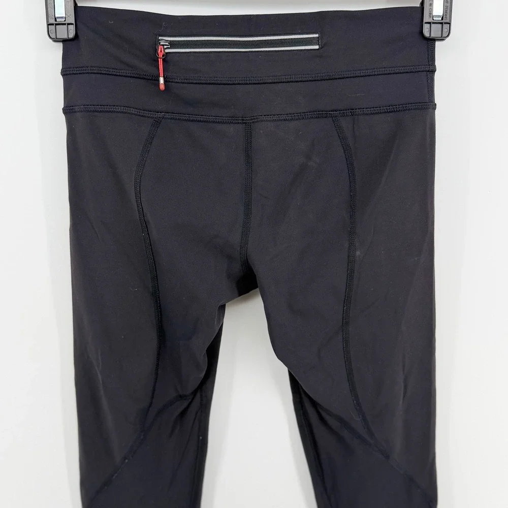 Lululemon Run Inspire Crop II Leggings Black Zip Pocket Mesh Size 4 Yoga